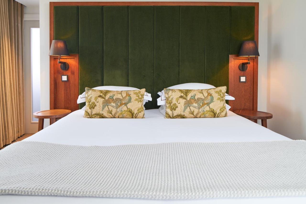 Cheval The Edinburgh Grand Aparthotel Bagian luar foto A bed with a mattress
